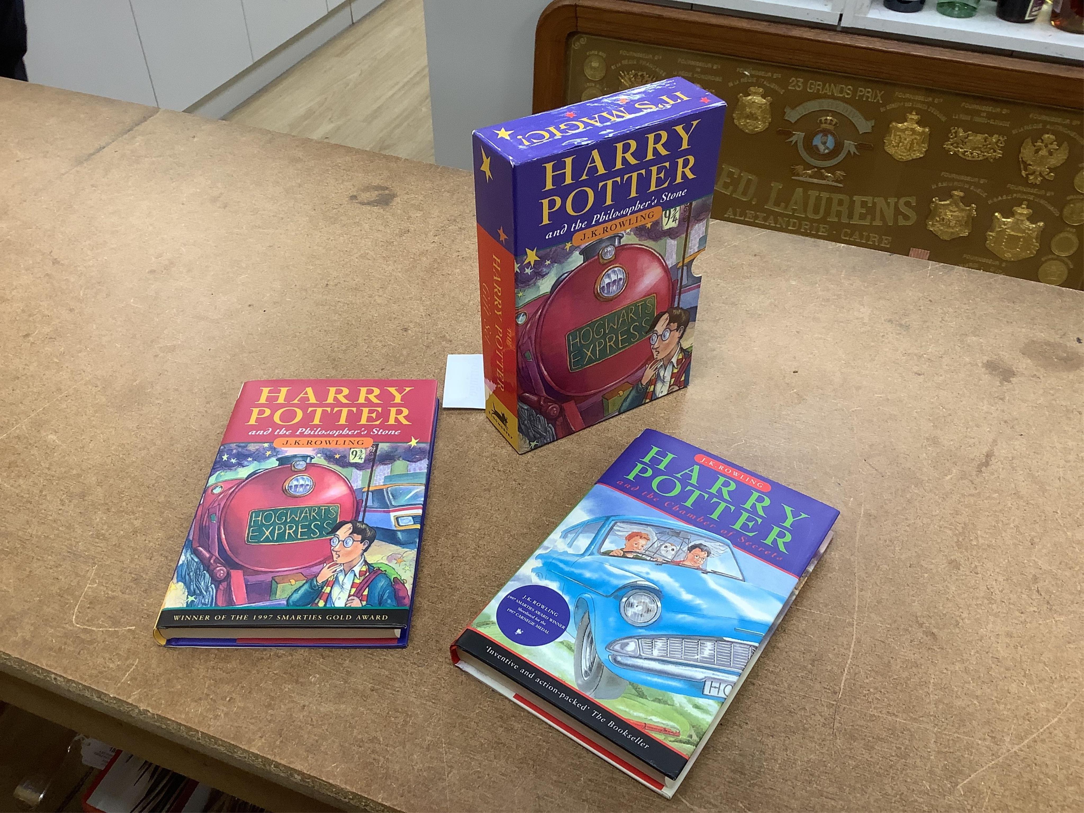Rowling, J.K. - Harry Potter and The Philosopher’s Stone / Harry Potter and the Chamber of Secrets. The boxed 'The Harry Potter Gift Set' (2 vols) both with half titles; original pictorial boards and d/wrappers and picto